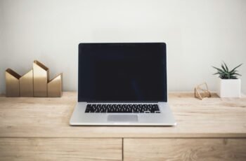 Laptop on a workspace for searching career opportunities