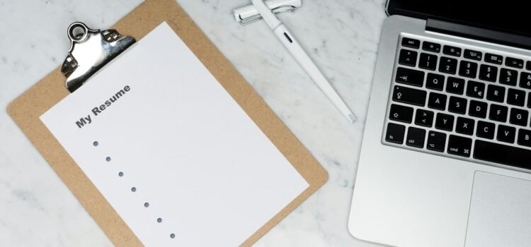 Resume documents arranged on a desk